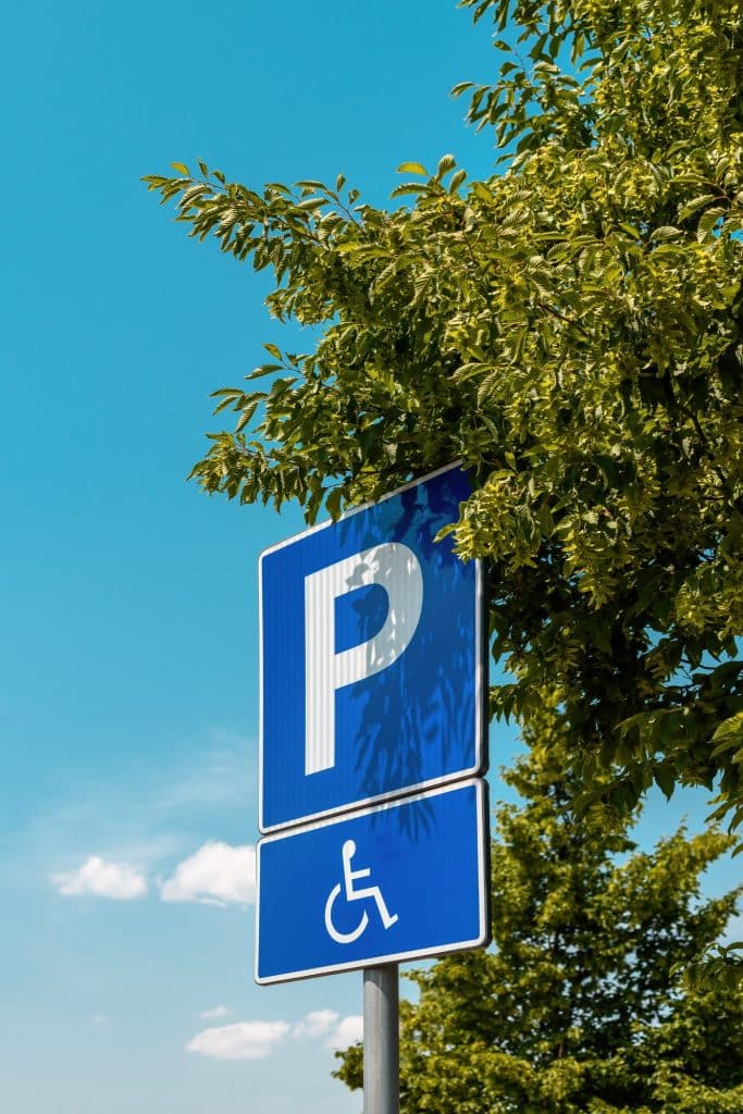 Reserved parking space sign, handicapped person with disability in wheelchair pictogram